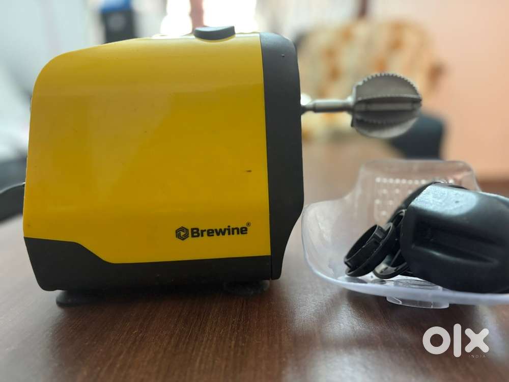 Coconut scrapper and juicer