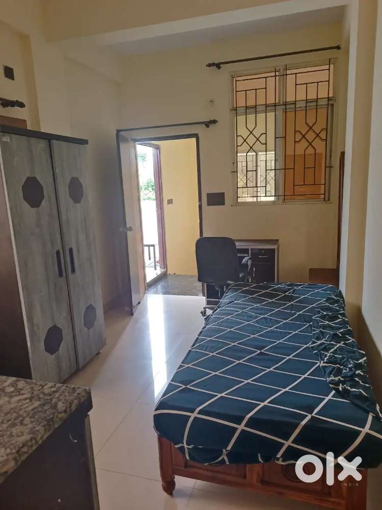 Single room with bed wardrobe kitchen  house portion