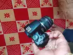 Canon 1000d. With 18-55 lence