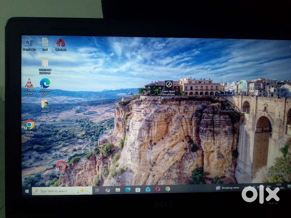 Dell laptop next to new condition