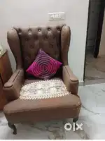 King chair and tripod lamp