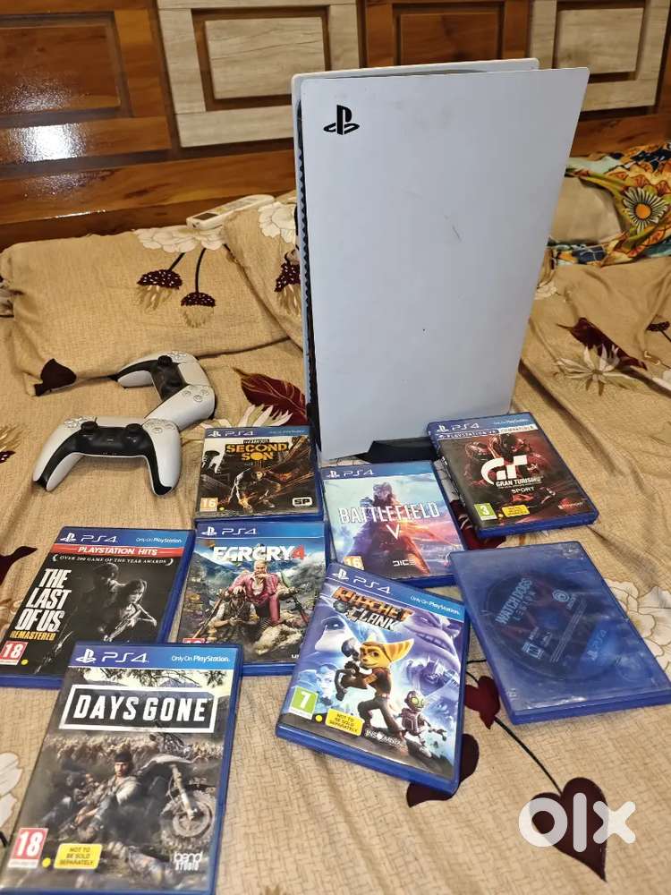 PlayStation 5 with 2 controller and 8 games