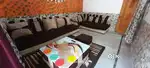8 SEATER SOFA (BROWN N CREAM)+2 PUFFY AND 1 CENTRE TABLE .