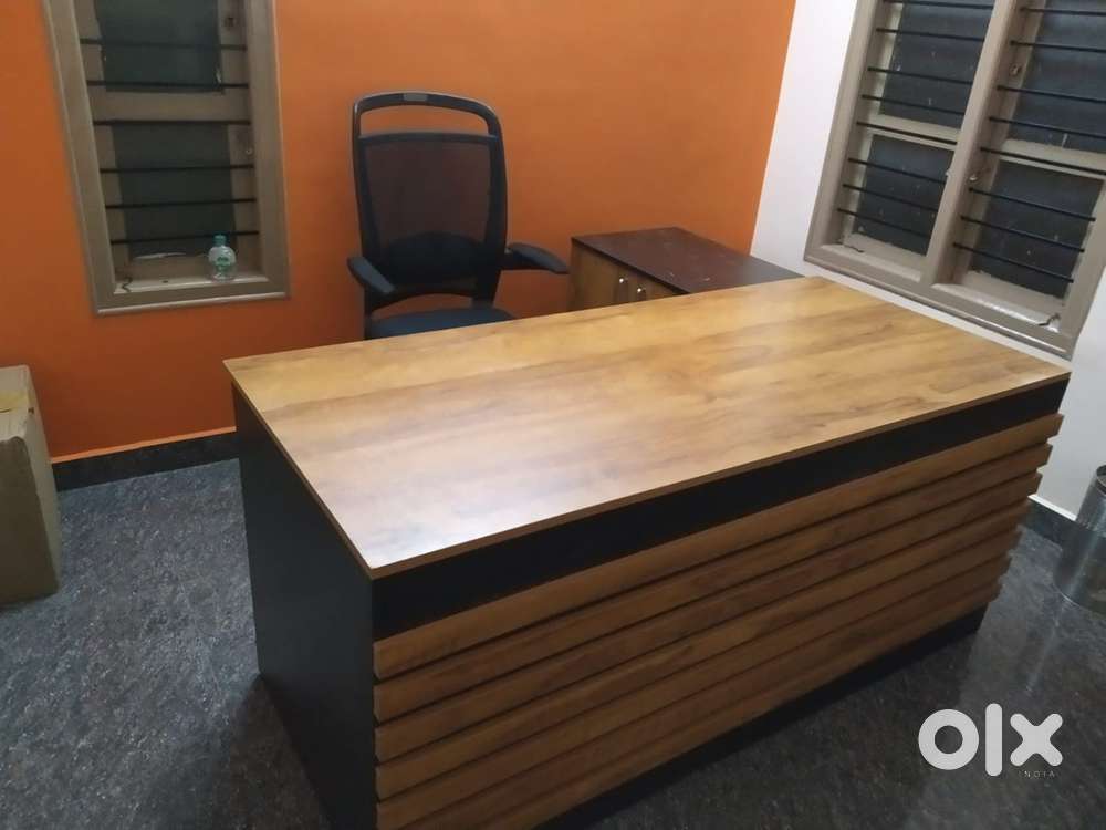 We are the manufacturer of office tables in low price