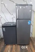 Whirlpool double door refrigerator and Godrej top load washing machine