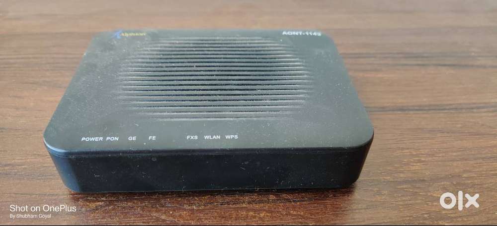 Alphion Ont 1143 GPON Fibre Wifi with adapter modem /router / repeater