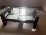 Coffee table(glass top & wooden legs )