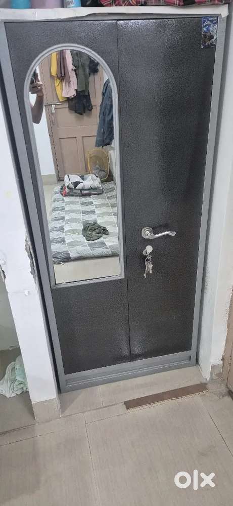 Almirah with attached mirror