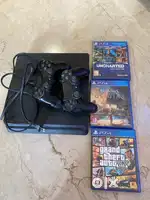 Ps4 Slim 500 GB; with 2 dualshock 4 controllers and 5 game CDs