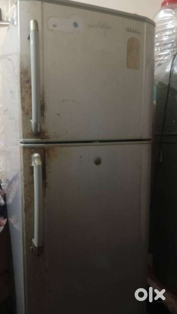 Double door Frige , 8 year old.