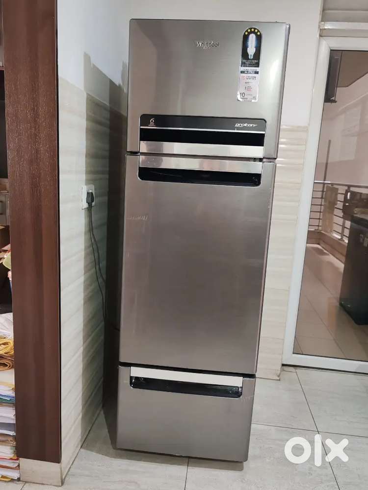 Whirlpool refrigerator and Top loading fully automatic washing machine