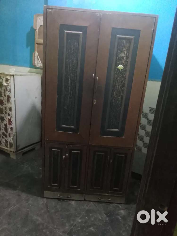 Wooden almari in this furniture