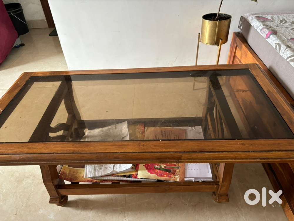 Wood and glass top center table for sale