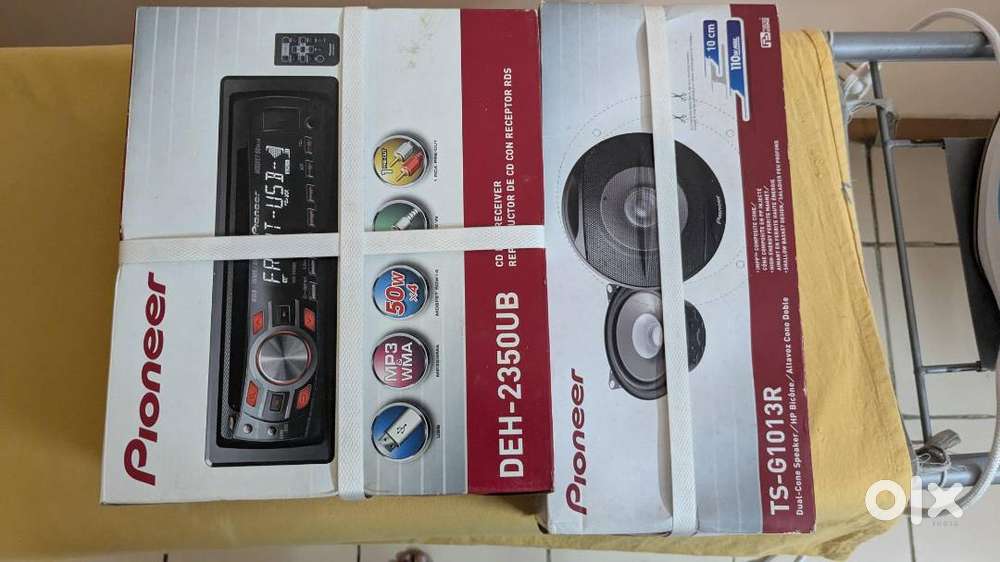 Unopened Pioneer car stereo system with speaker and Remote control.