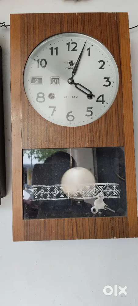 Jamal. 31days day and date wall clock