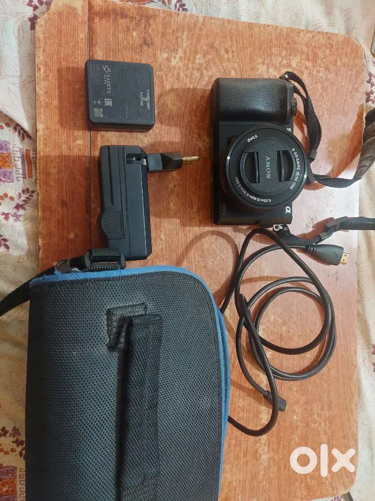 Sony a6000 with kit lens and pouch