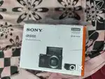 SONY A6100 with 16-50mm lens in good condition with 2.5 years warranty