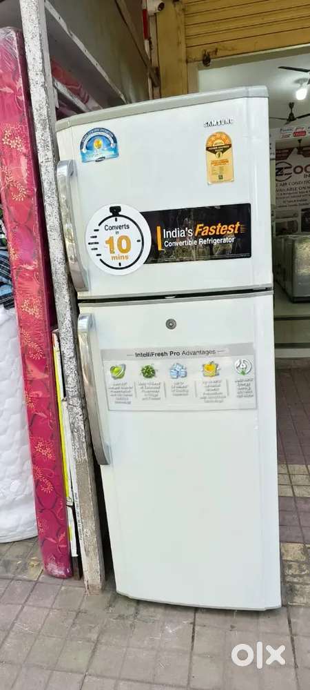 Samsung double door fridge good condition with warranty 1 year old