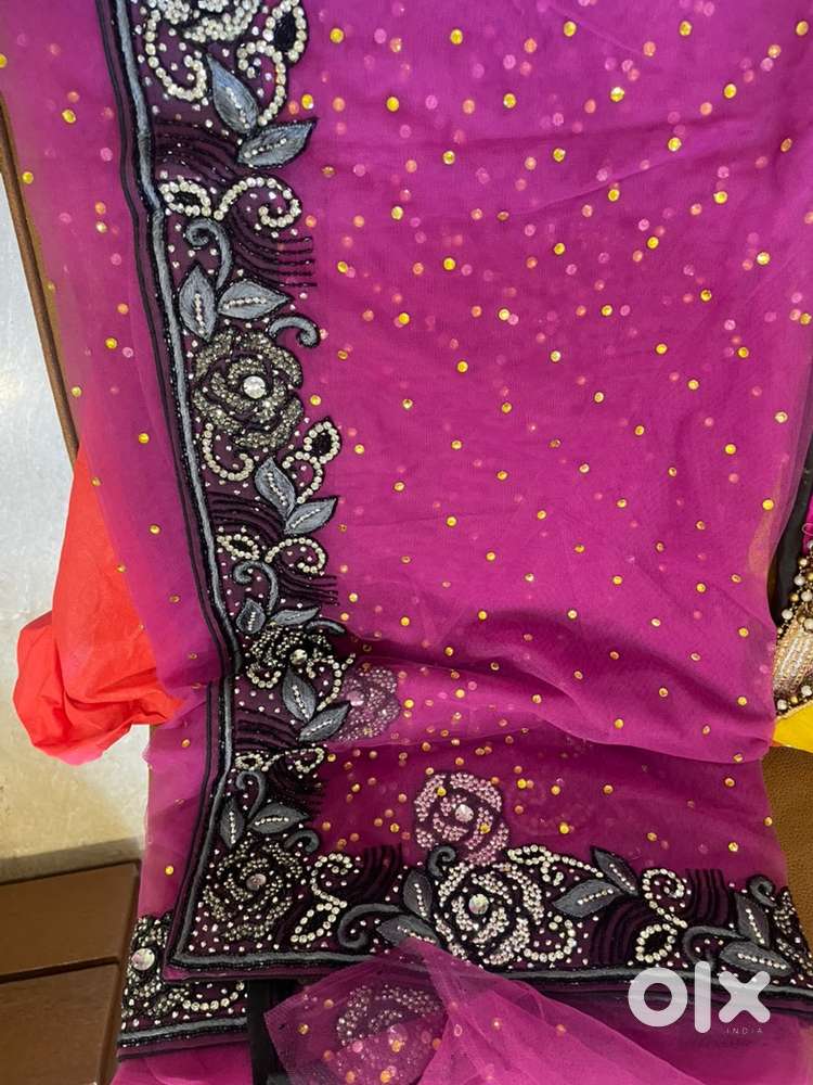 Margenta colour net saree