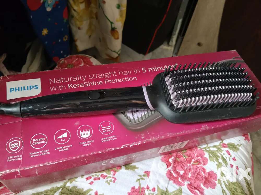 Heated straightening brush