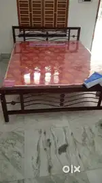 Want to sell a bed with mattress and a table with two chair