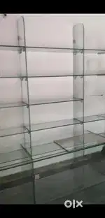 A glass cupboard is built in the shop.