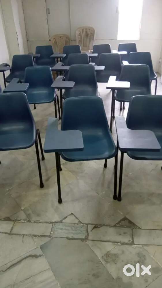 Chair with writing pad