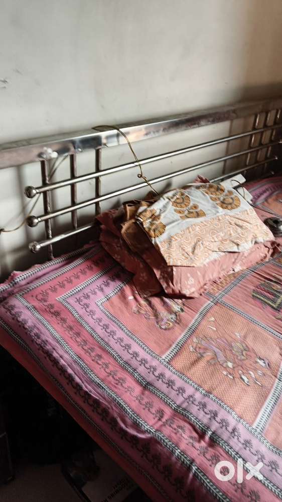 Durable steel bed, excellent condition. Perfect for any bedroom.