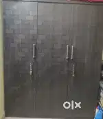 Stainless steel sofa cum bed, wardrobe, L shape cabinet, and shoe rack