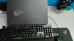 Asus Rog Strix g15 gaming laptop with accessories for sale.