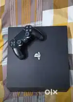 Ps4 slim 500gb with 4 games inbuilt and 2 controllers