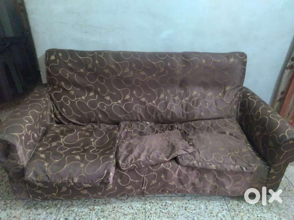 A very big sofa  with cushions