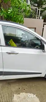 White colour, single hand driven, top model