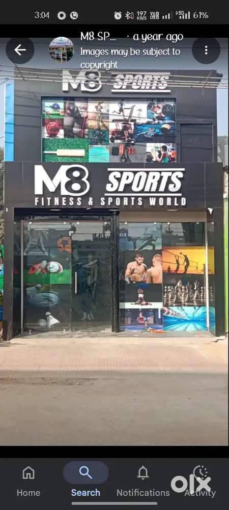 Salesmen in sports shop