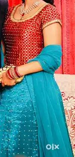 Beautiful Lehenga Maroon and Blue with golden sequence and embroidery