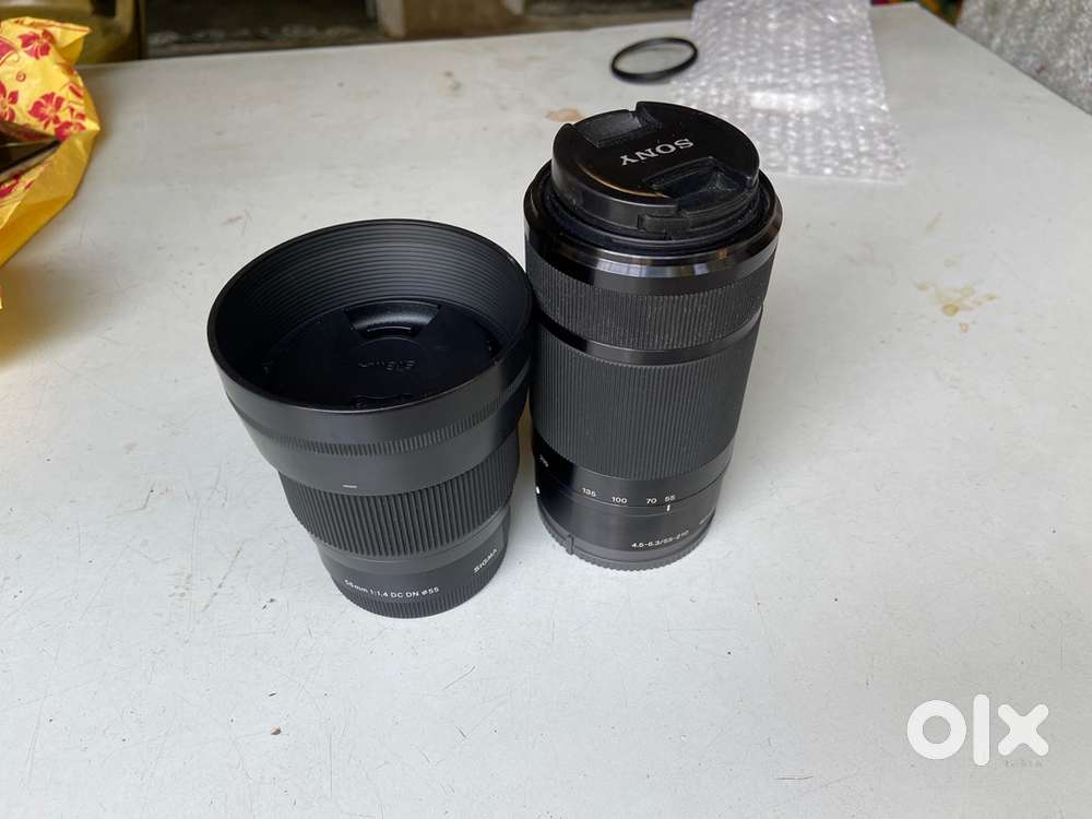 Sigma 56mm f1.4 and Sony 55~210mm zoom sony e mount lenses unused cond
