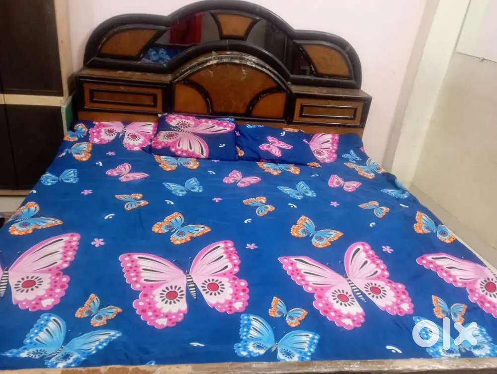 Woden double bed/iron single bed urgent sale