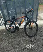 Cosmic Orange Cosmic Terra 27.5T Bicycle with double disc brakes