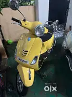 Rs 55000 Vespa yellow 150cc