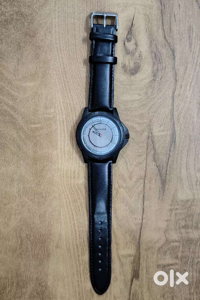 Sonata black analogue men's watch 77018PL01 with new strap