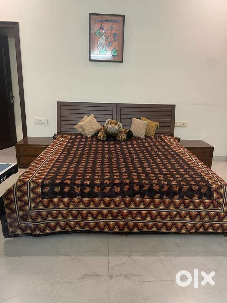 Wooden finished bed with bed side tables