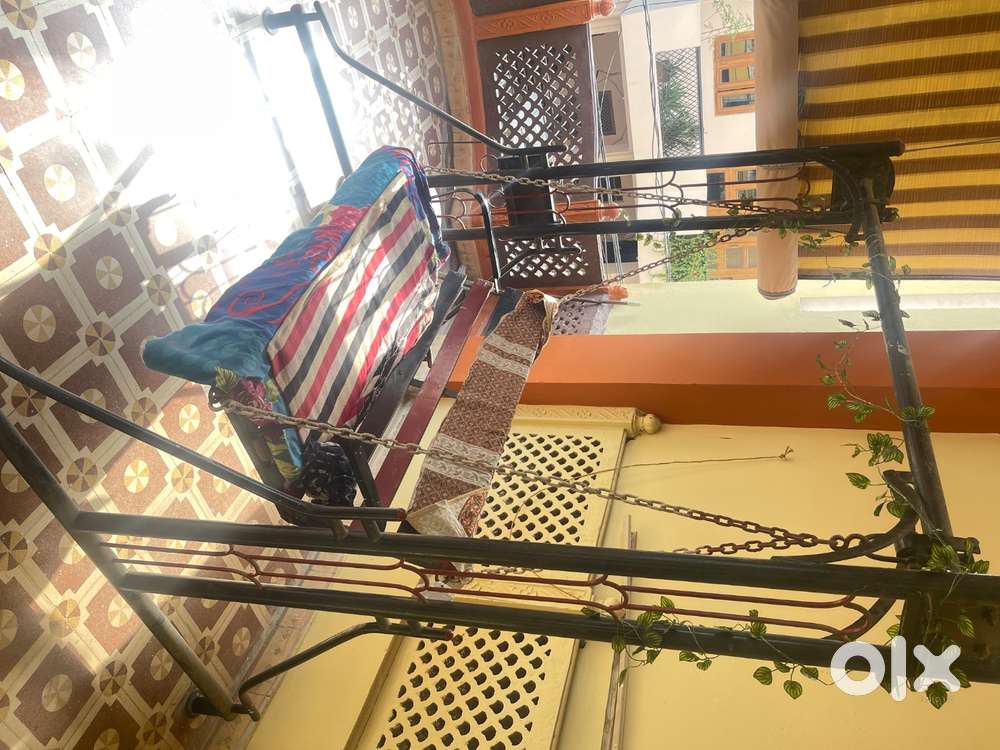 Elegant Iron Swing for Balcony or Veranda – Traditional Comfort Meets