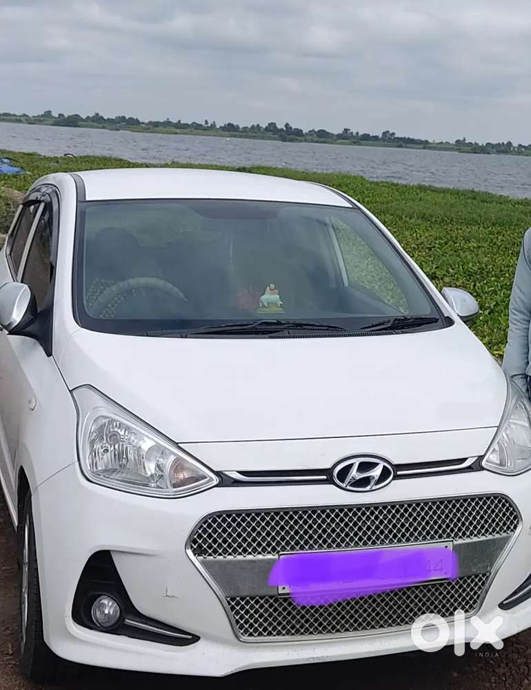 एक हाती वापरलेली , उत्तम कंडीशन सर्व असेसरीसहीत गाडी विकणे आहे