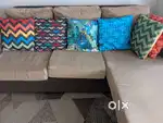 L-Shaped Sofa with Cushions – Great Condition