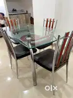 Glass top dining table for 4