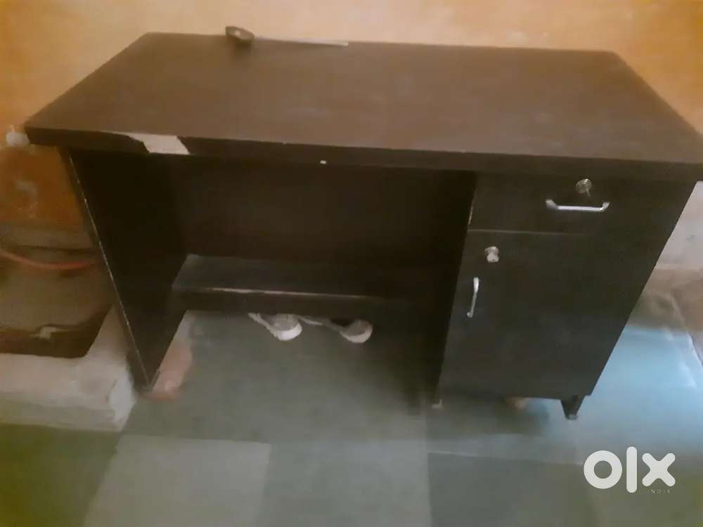 2 office tables and 2 chairs