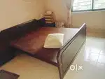 Good cot with side drawers