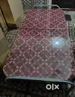 Foldable cot with mattress