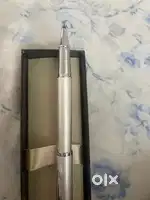 IM white chrome trim roller ball pen from parker for sale