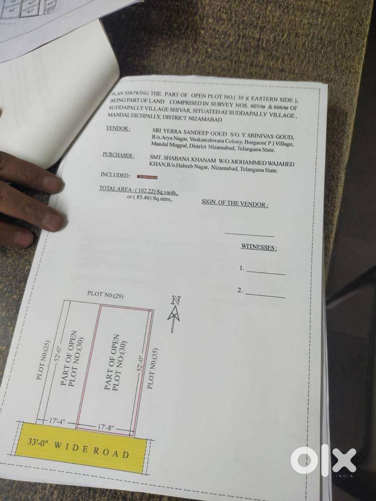 open plot beside Telangana university main highway